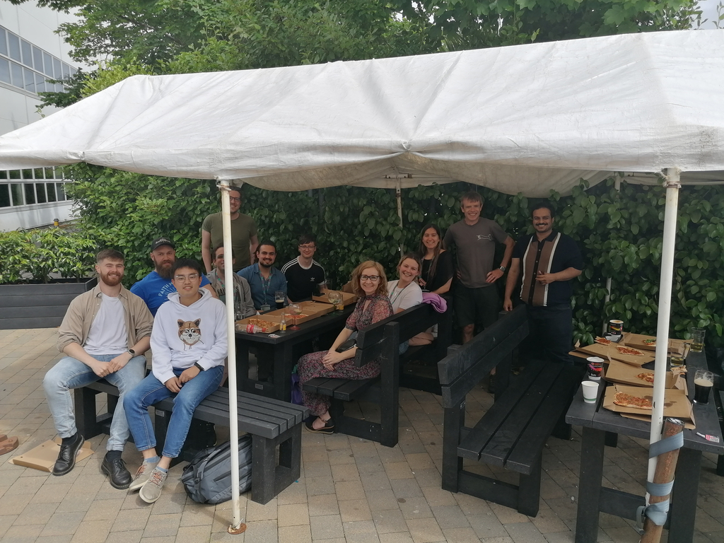 A University of Galway lab get-together to celebrate project progress, beside the river Corrib