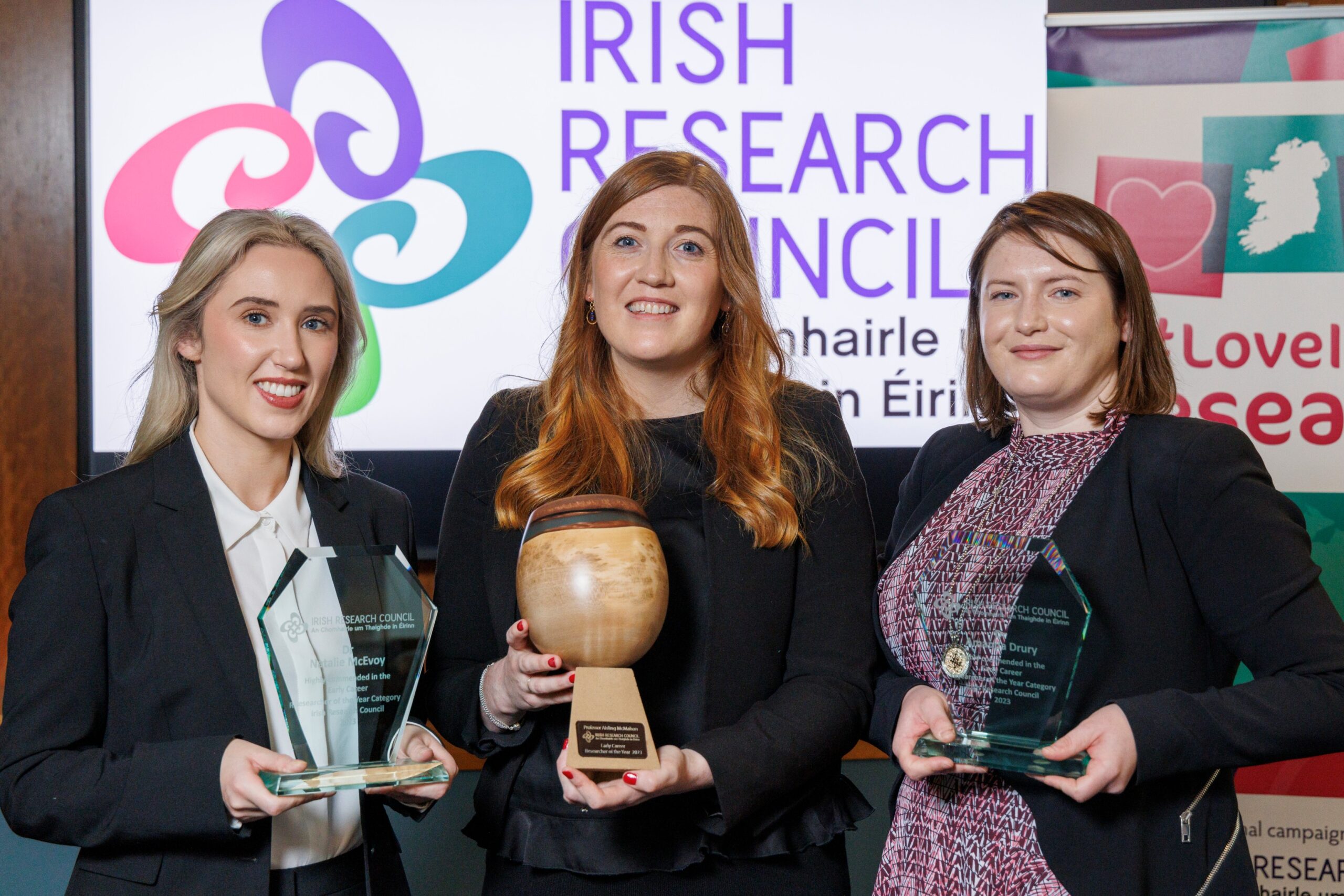 Professor Aisling McMahon, Dr Amanda Drury and Dr Natalie McEvoy pictured holding their trophies