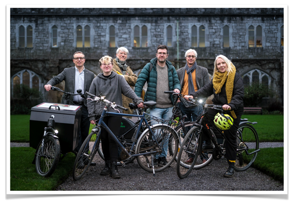 Socio cycle project team with bicycles